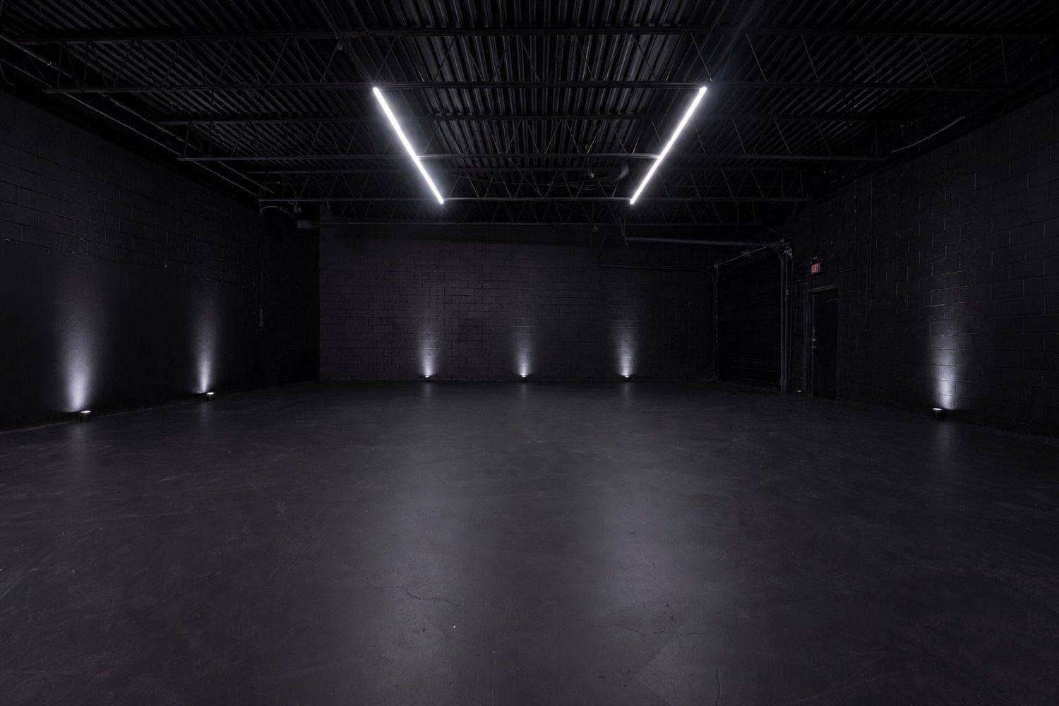 The Void blackout stage under white light